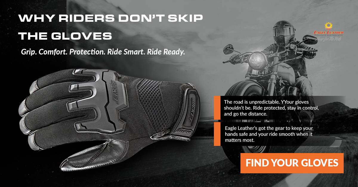 A black armored motorcycle glove with reinforced knuckles displayed next to a rider on a cruiser bike, promoting grip, comfort, and protection. Eagle Leather branding included.