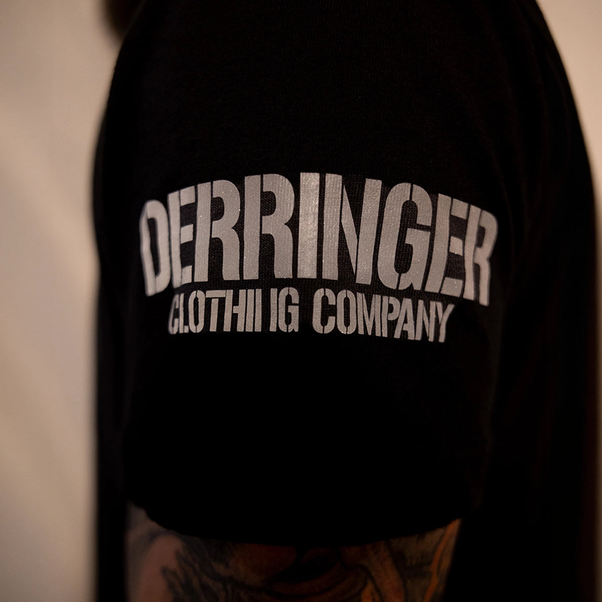 Derringer Men's 2nd Amendment Shirt CP-602 in black, sleeve logo detail
