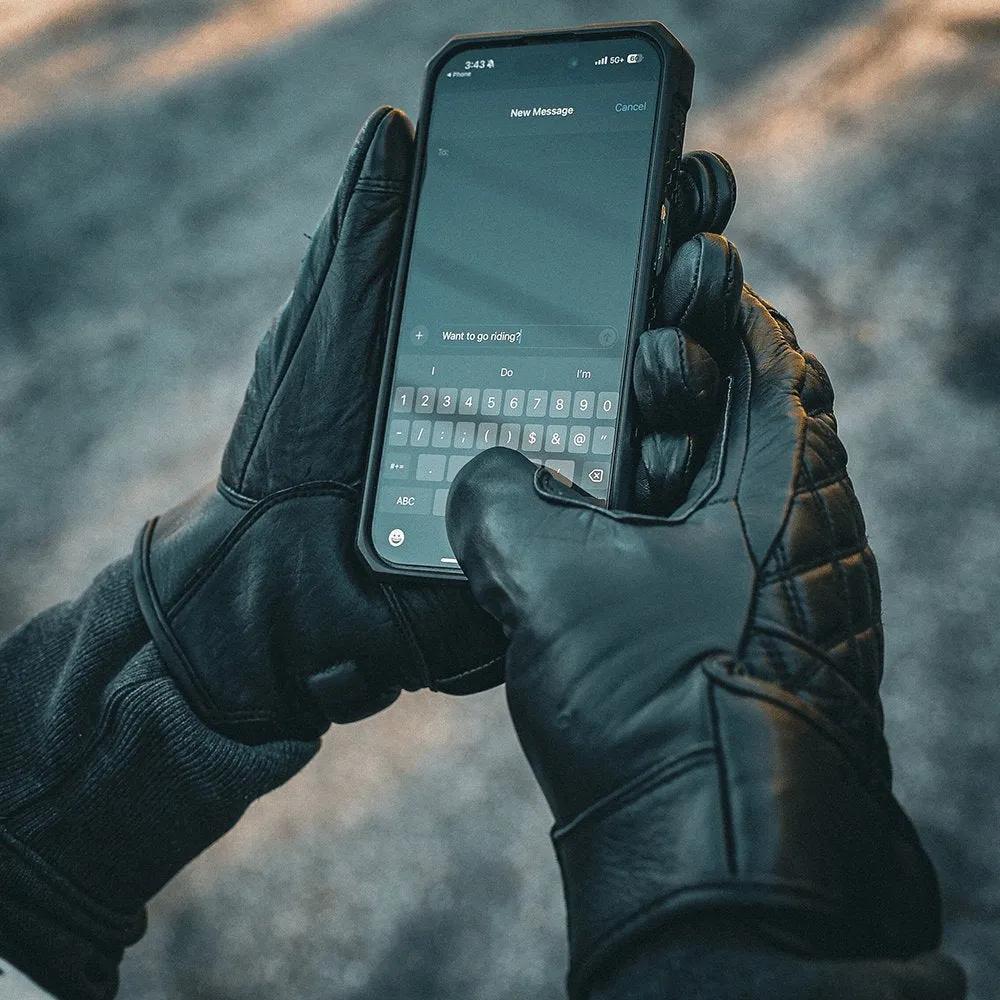 Unik Diamond Stitch Gloves in Black / Black, touchscreen fingertip in use