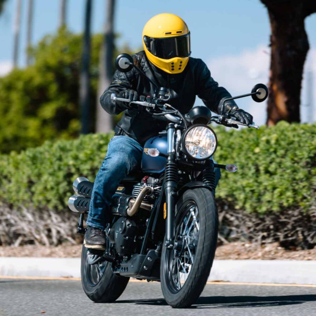 HJC V10 Solid Full Face Helmet Yellow helmet on a rider, front riding view