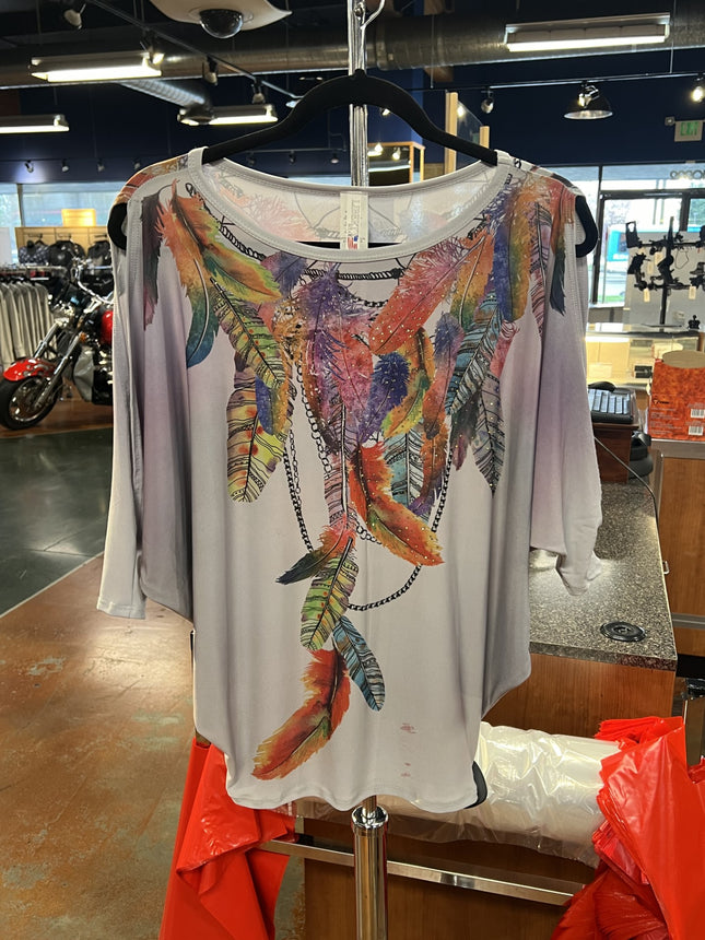 Cold Shoulder Feathers Shirt: Description:-Fun and flirty, this printed cold-shoulder top offers comfort and style