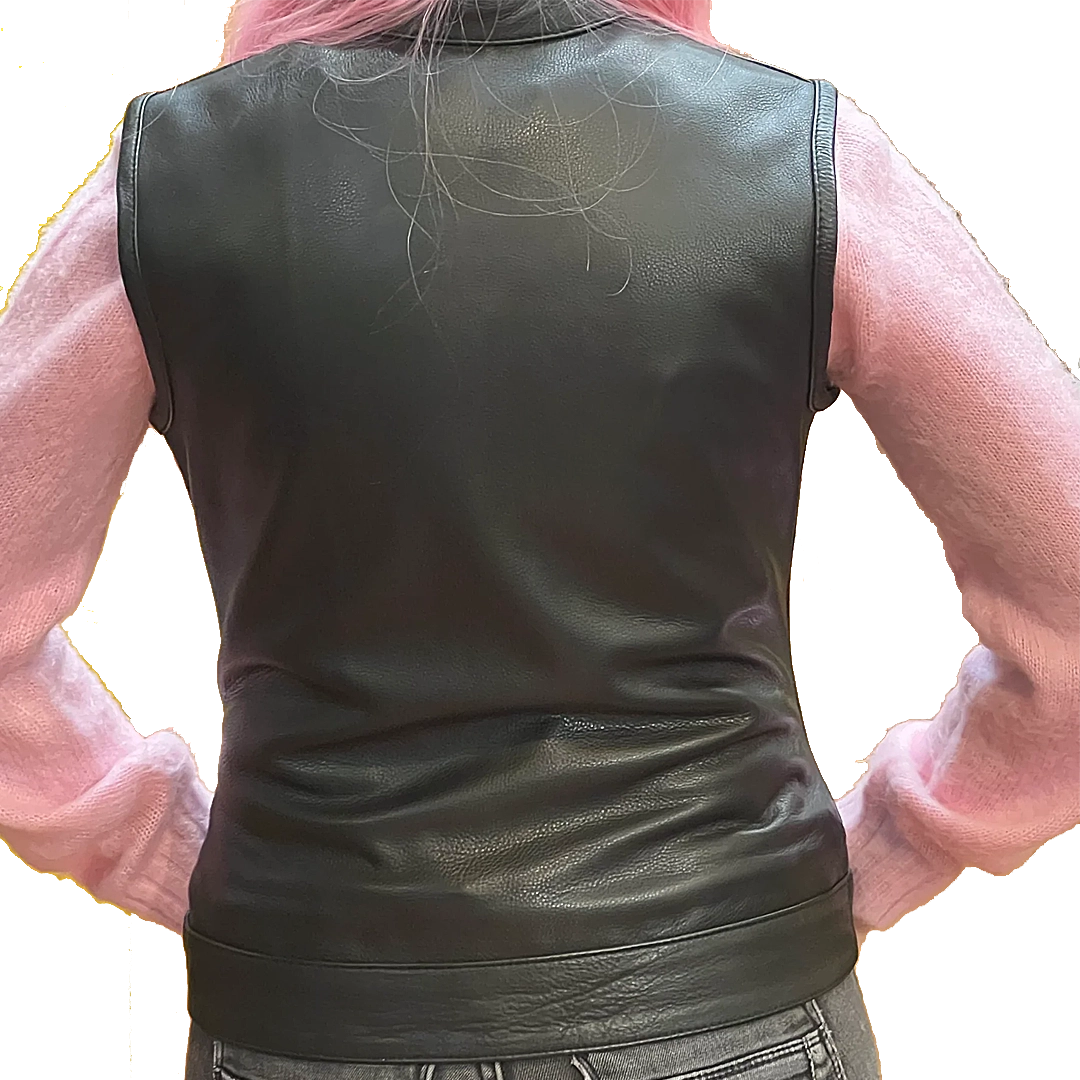Ladies Dot Leather Club Vest: FEATURES:


Club style with banded collar, covered snaps and cropped center zipper
Two buttoned