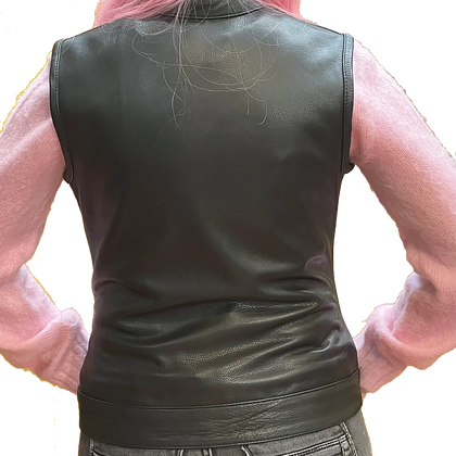 Ladies Dot Leather Club Vest: FEATURES:


Club style with banded collar, covered snaps and cropped center zipper
Two buttoned