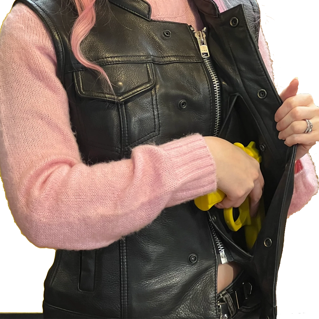 Ladies Dot Leather Club Vest: FEATURES:


Club style with banded collar, covered snaps and cropped center zipper
Two buttoned