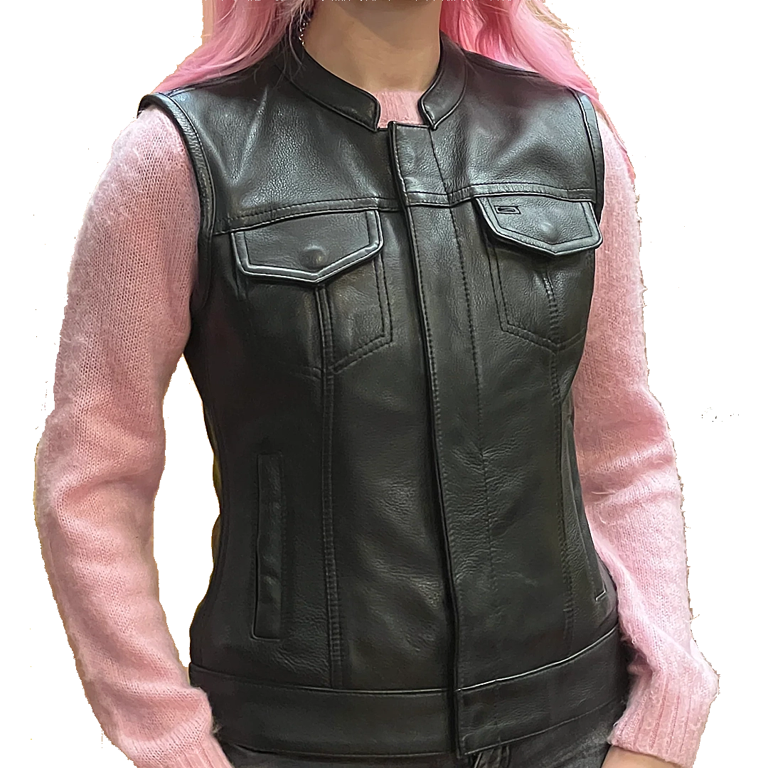 Ladies Dot Leather Club Vest: FEATURES:


Club style with banded collar, covered snaps and cropped center zipper
Two buttoned