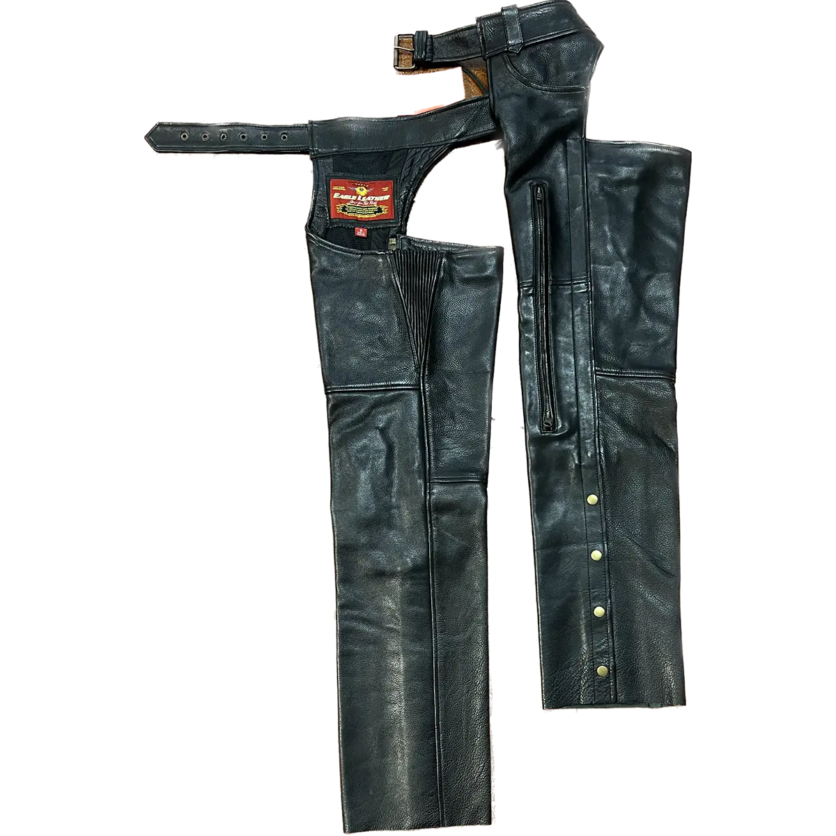 Inside and outside leg view of black leather vented motorcycle chaps showing zippers, snaps, and stretch panel details.