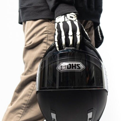 Cortech Standard Issue Bones Gloves in Black/White - worn while holding a helmet