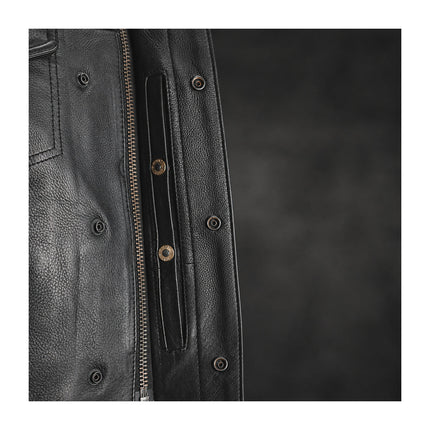 Sharp Shooter covered center zipper and snap closure detail
