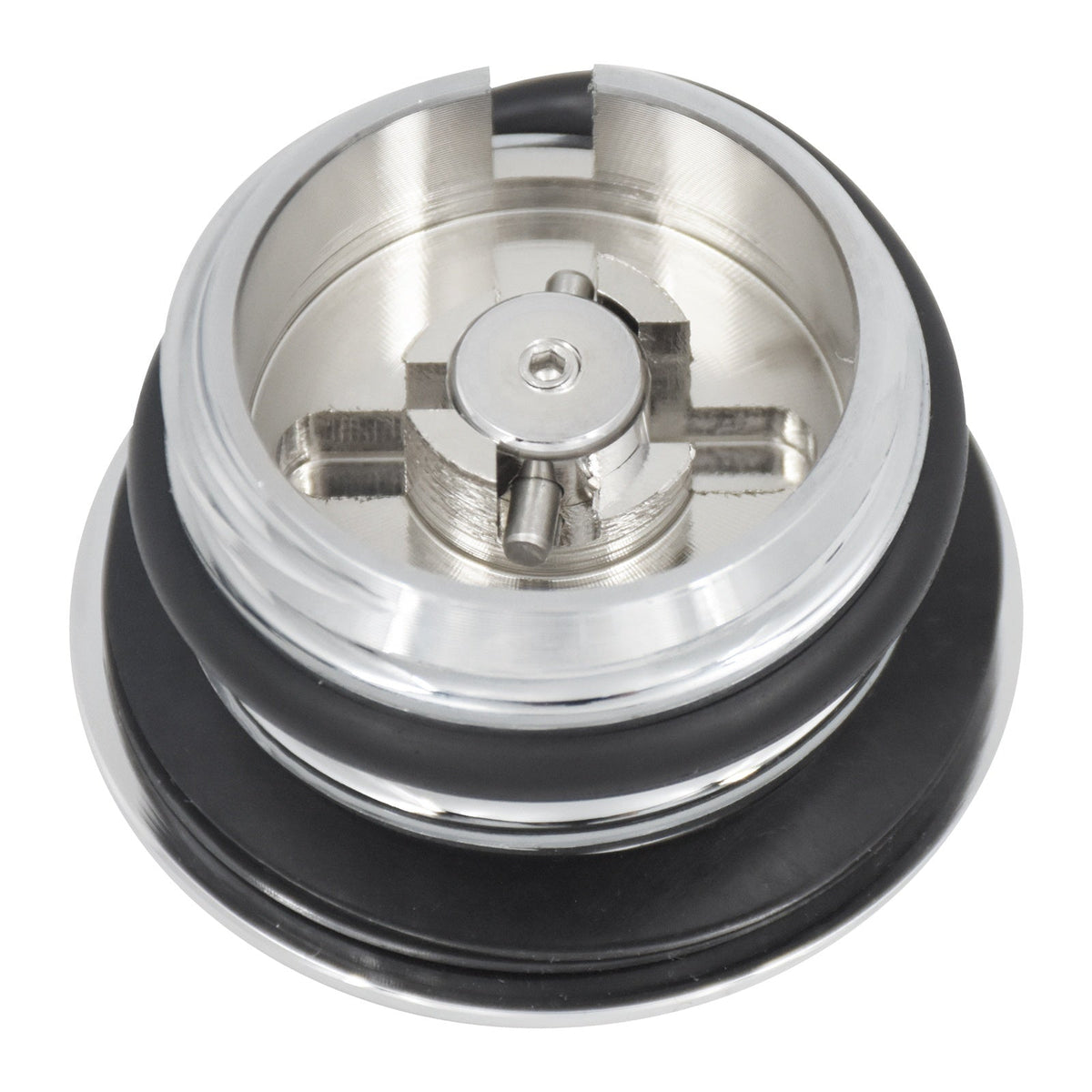 Chrome gas cap shown raised and flush