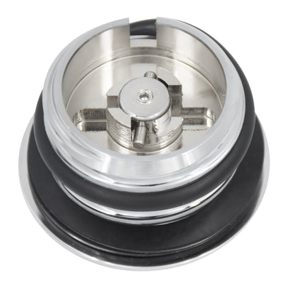 Chrome gas cap shown raised and flush
