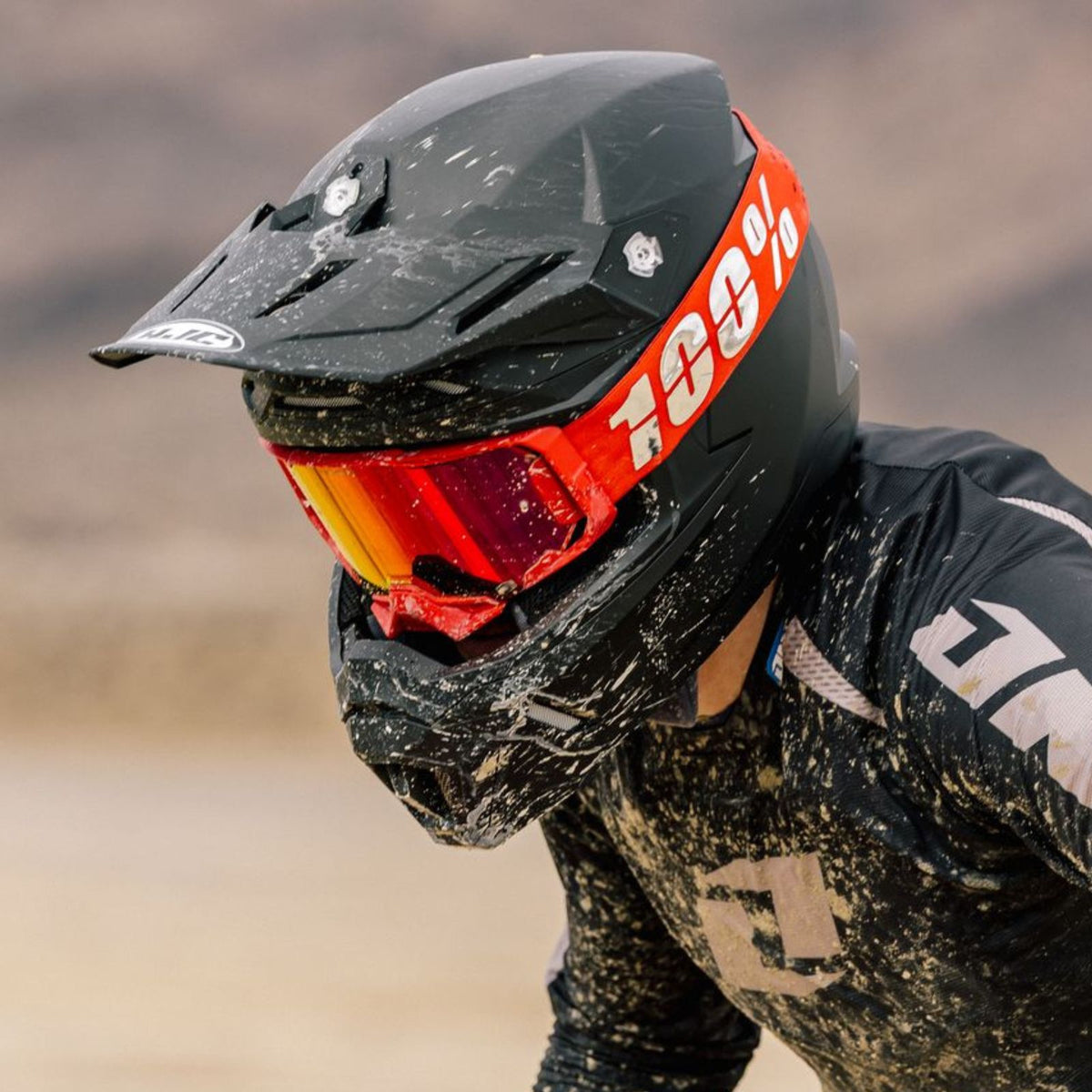 HJC C50 Matte Black helmet worn with off-road goggles