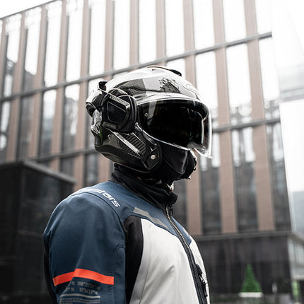 Rider wearing the HJC F100 Carbon helmet in an urban setting