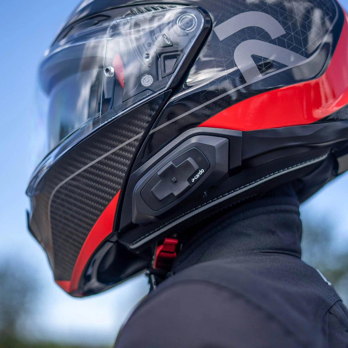 HJC Packtalk installed on a compatible HJC helmet, lifestyle view