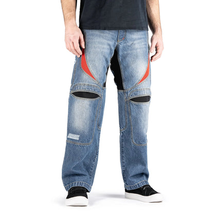 Rider wearing ICON Hooligan Jeans in Blue front view