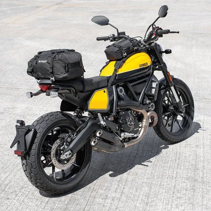 Kriega US 20 Drypack installed on a motorcycle for road travel