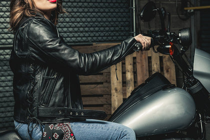 Ladies Popstar black leather motorcycle jacket side view while riding