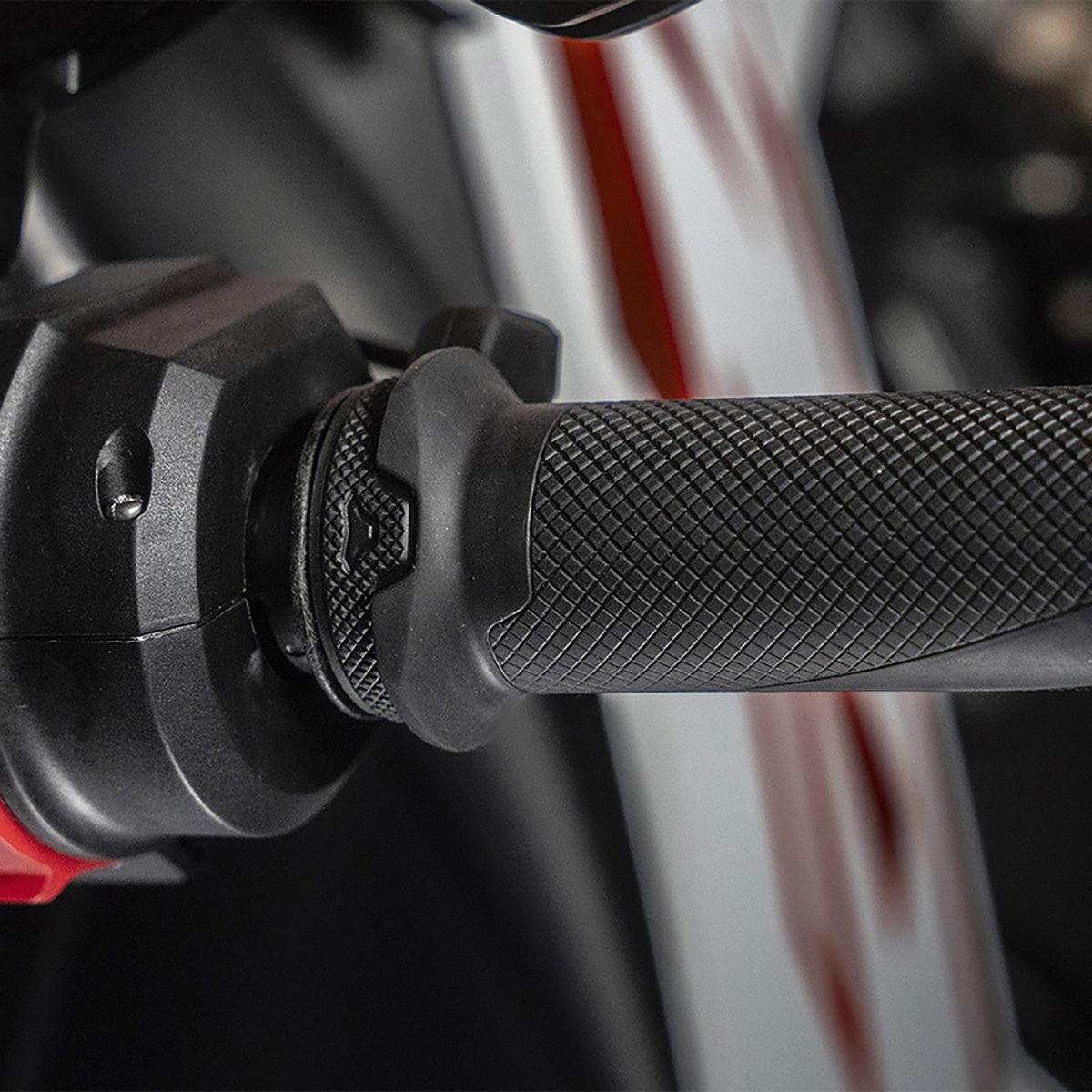 Macna Heated Bluetooth Grips in black, installed grip texture and open-end detail
