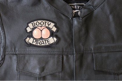 Booty Pirate patch installed on a leather vest