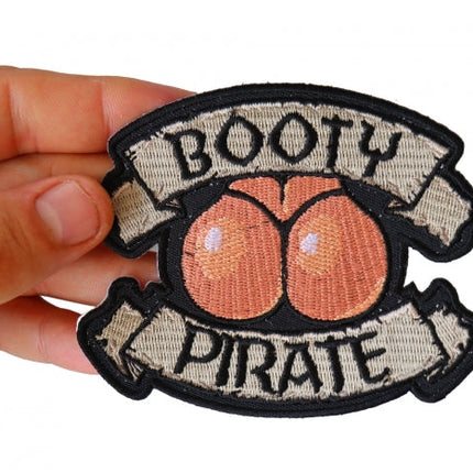 Booty Pirate patch shown in hand for size reference