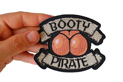 Booty Pirate patch shown in hand for size reference