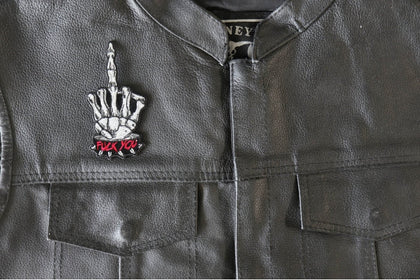 FU middle finger patch installed on a black leather vest