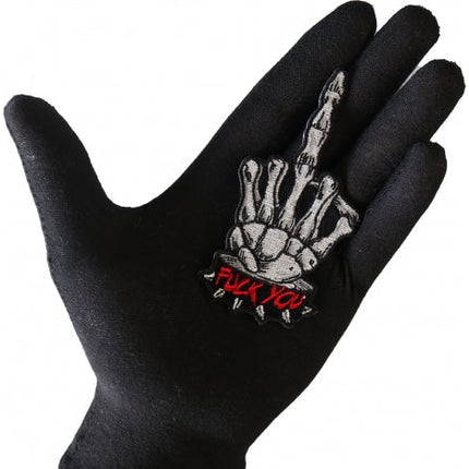 FU middle finger patch shown in hand for size reference