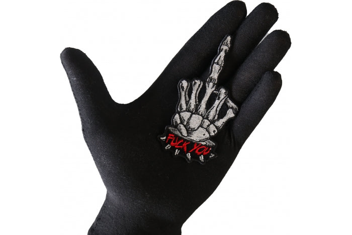 FU middle finger patch shown in hand for size reference