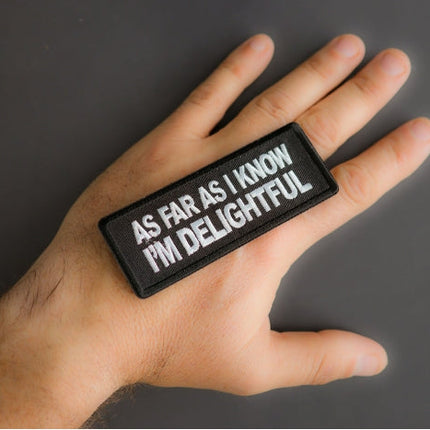 Delightful patch shown in hand for size reference