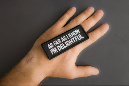 Delightful patch shown in hand for size reference