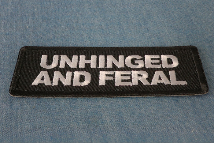Unhinged and Feral patch embroidered detail