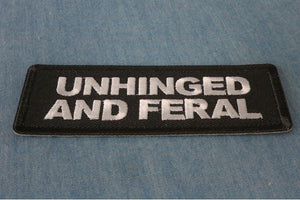 Unhinged and Feral patch embroidered detail