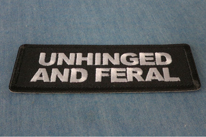 Unhinged and Feral patch embroidered detail