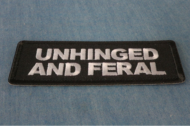 Unhinged and Feral patch embroidered detail