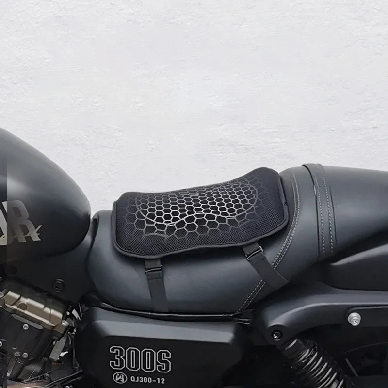 Pillion AirGel cushion secured to a motorcycle passenger seat