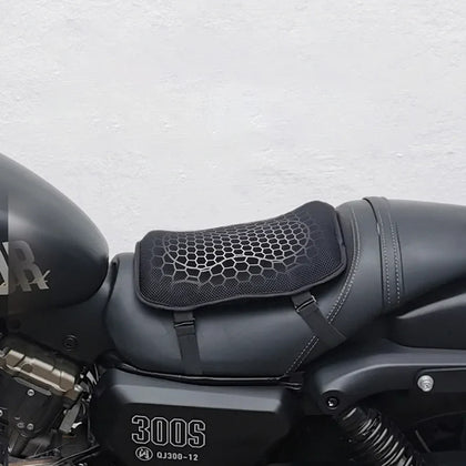 Pillion AirGel cushion secured to a motorcycle passenger seat