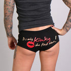 Ladies Biker Shorts Kinky: These comfortable boy shorts in the color black features a bright red kiss mark and the text 
