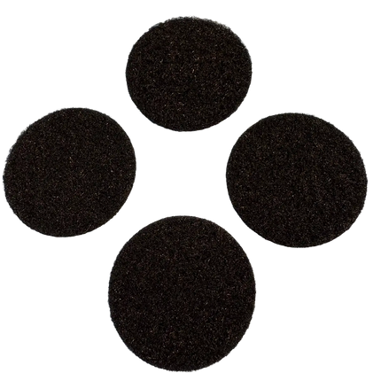 Set of four round black adhesive Velcro pads for securing motorcycle gear or accessories.