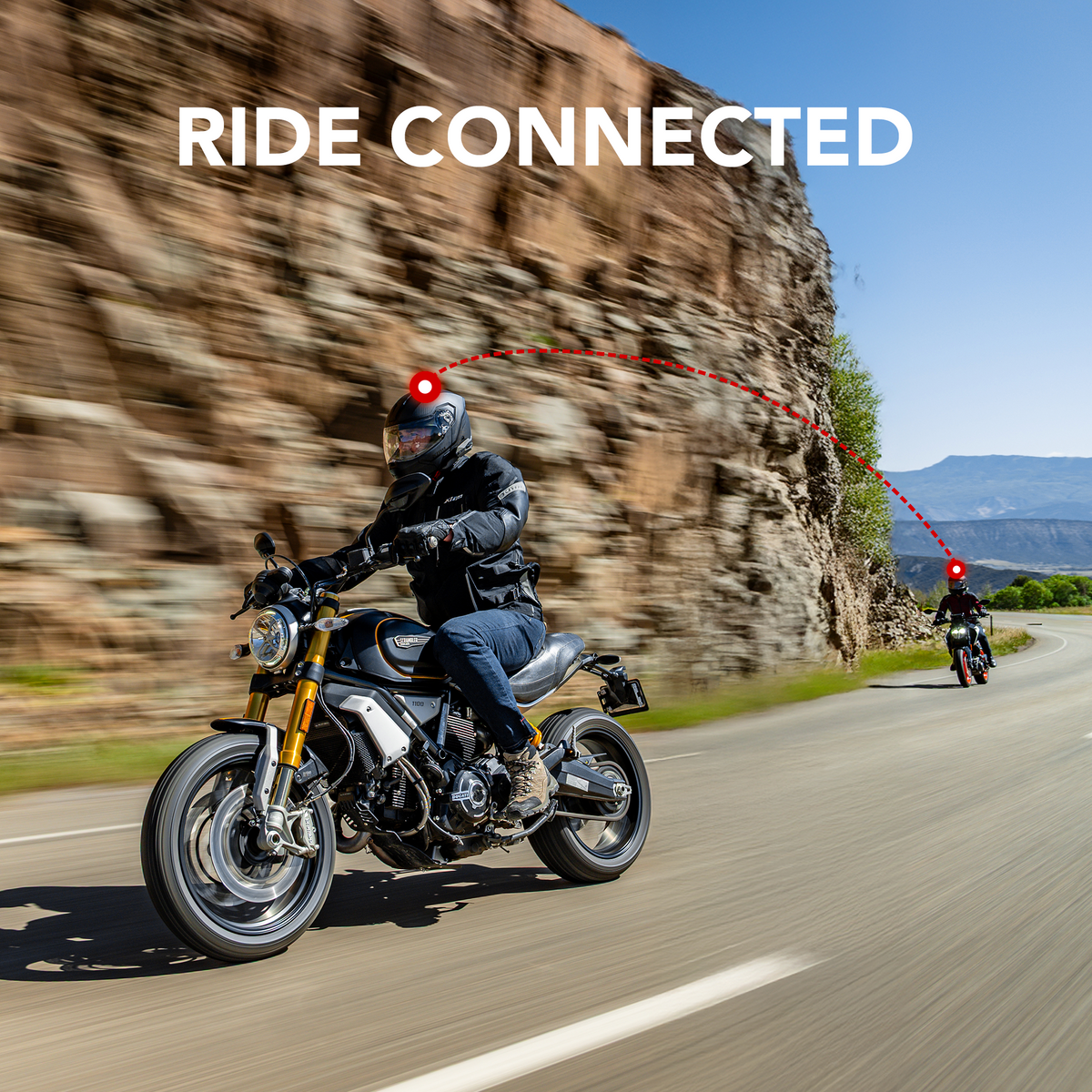 Two motorcycle riders using Sena 60X communication systems on the road