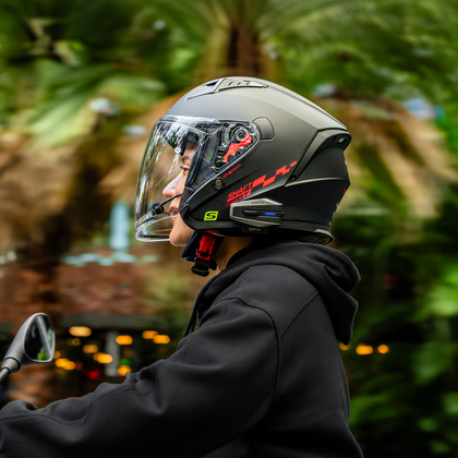 Sena VORTEX Bluetooth intercom installed on a full-face motorcycle helmet
