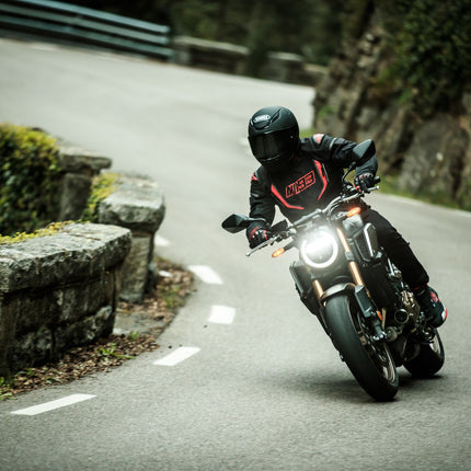 Shoei RF-1400 Solid helmet - Matte Black on-road riding view
