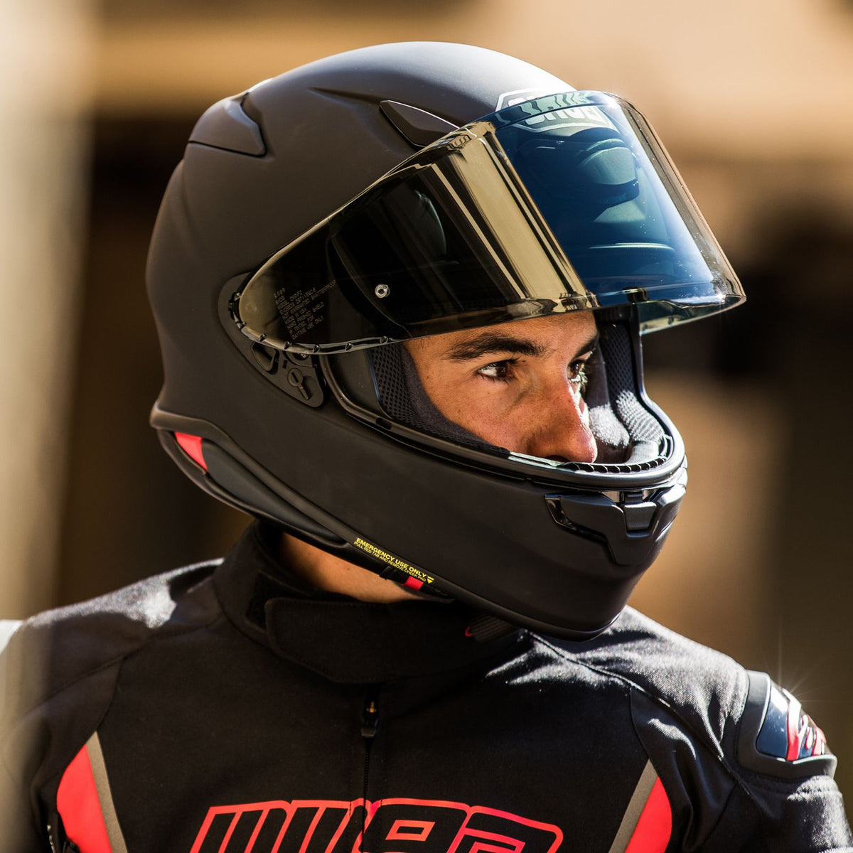 Shoei RF-1400 Solid helmet - Matte Black with face shield raised