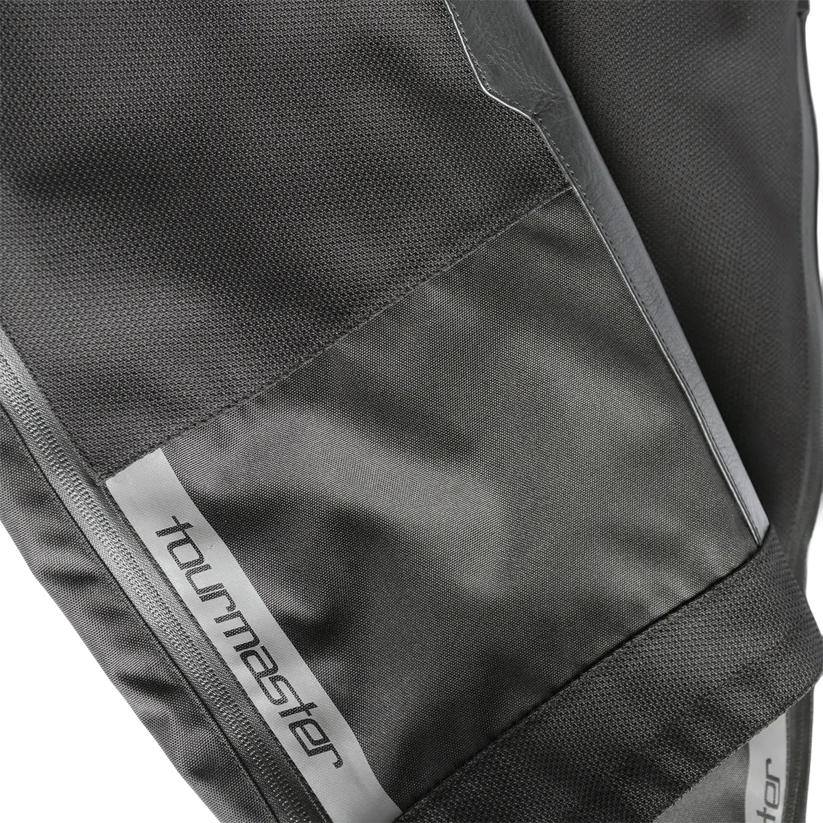Tourmaster Centurion Lite black one-piece suit, leg cuff closure detail