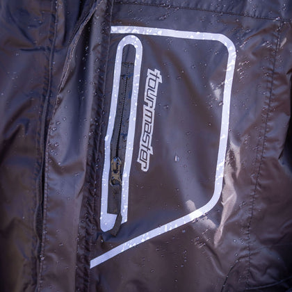 Tourmaster Defender Two-Piece Rainsuit in Black - waterproof chest pocket detail