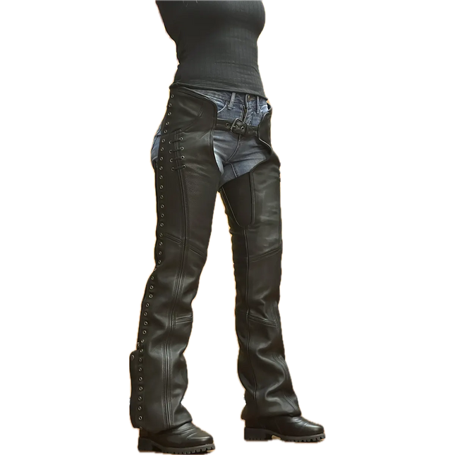 Women's black leather motorcycle chaps with lace-up sides, silver grommets, and adjustable front belt, worn over denim jeans and paired with black boots.