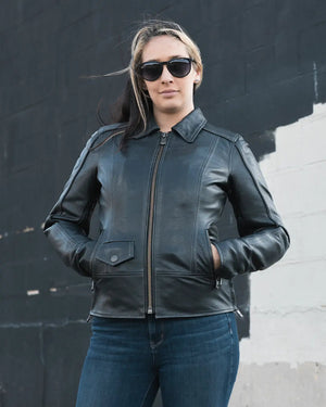 Women's Freedom black leather motorcycle jacket worn by a rider
