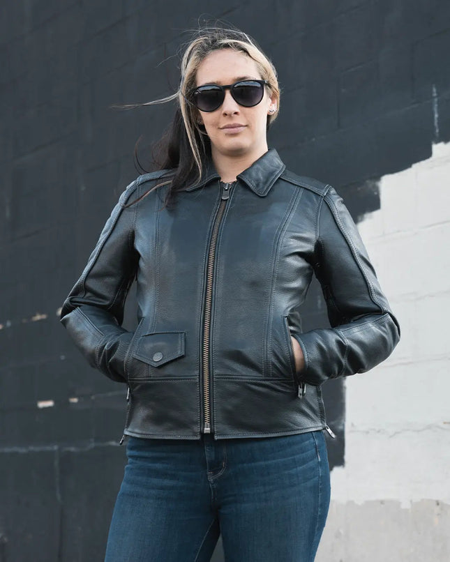 Women's Freedom black leather motorcycle jacket worn by a rider
