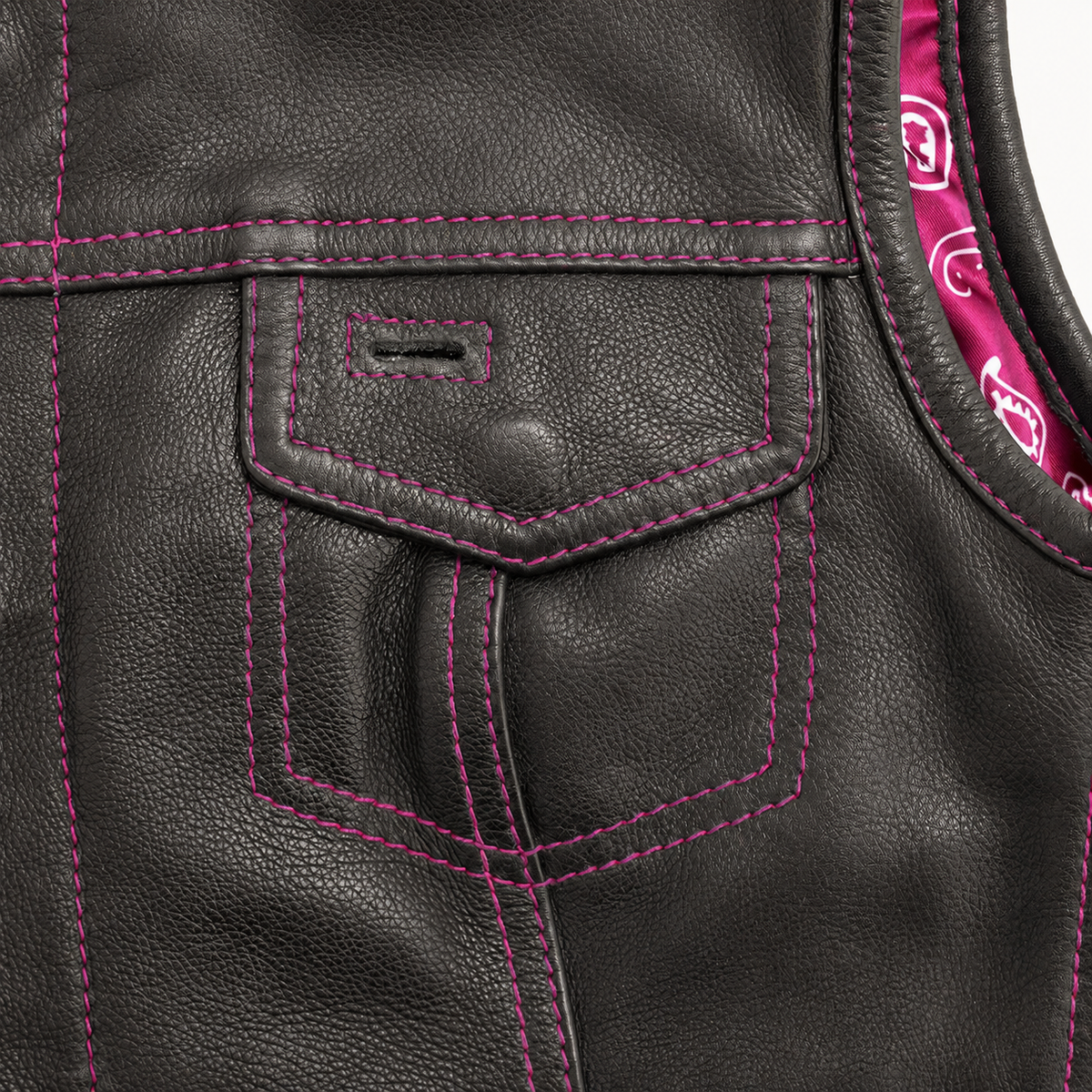 Snap-down chest pocket and pink contrast stitching detail