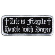 Life Is Fragile Patch 4 Inch: Description
"Life is Fragile, Handle With Prayer" embroidered in fancy white lettering and cros