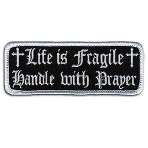 Life Is Fragile Patch 4 Inch: Description
"Life is Fragile, Handle With Prayer" embroidered in fancy white lettering and cros
