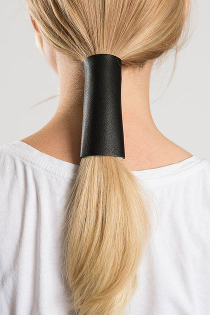 12" Solid Leather Extra Wide: Features:

Full Grain Leather Ponytail Holder
Classic Solid Color Leather
Extra Wide Available 
